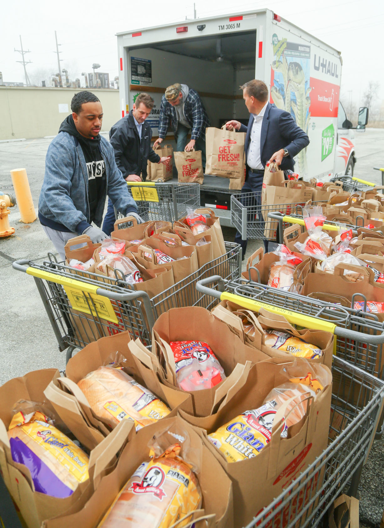 Strack & Van Til is giving North Township 100 bags of food